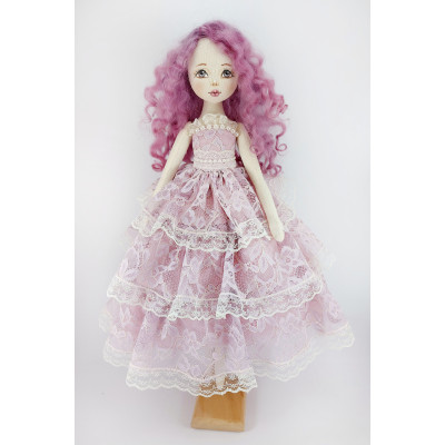 Doll In A Purple Lace Dress