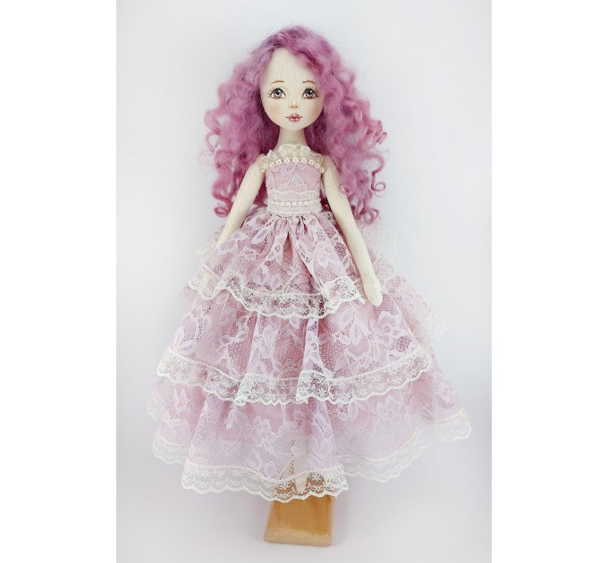 Doll In A Purple Lace Dress