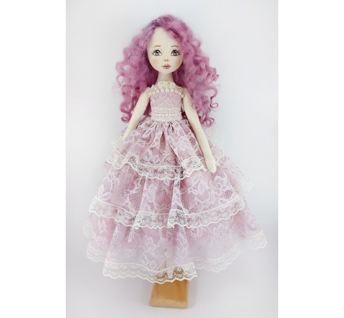 Doll In A Purple Lace Dress