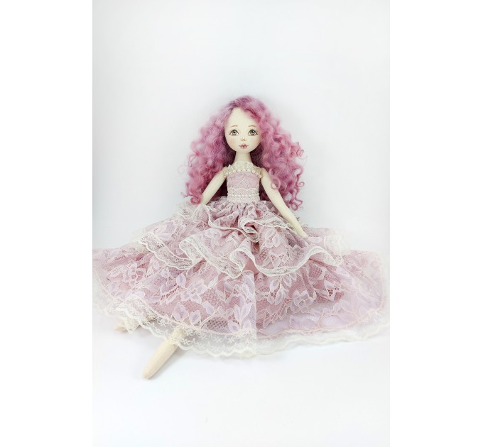 Doll In A Purple Lace Dress