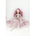 Doll In A Purple Lace Dress