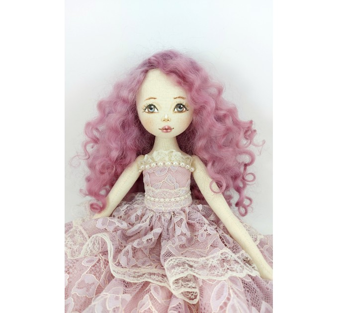 Doll In A Purple Lace Dress
