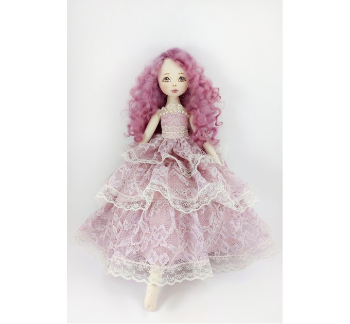 Doll In A Purple Lace Dress