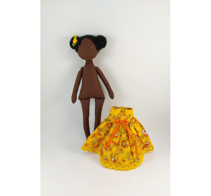 African Doll In A Yellow Dress