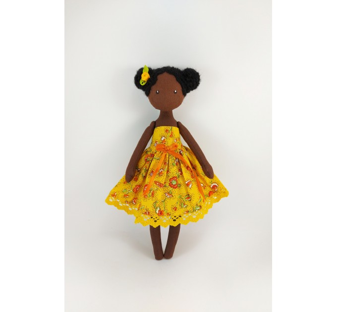 African Doll In A Yellow Dress