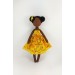 African Doll In A Yellow Dress