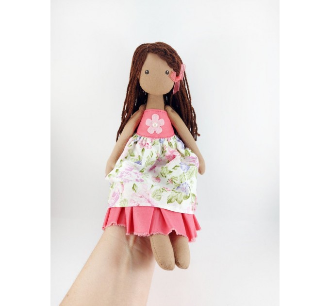 Black Doll With A Brown Hair