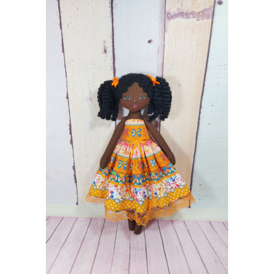 Little Black Doll In Different Dresses