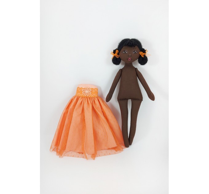 Little Black Rag Doll In An Orange Dress