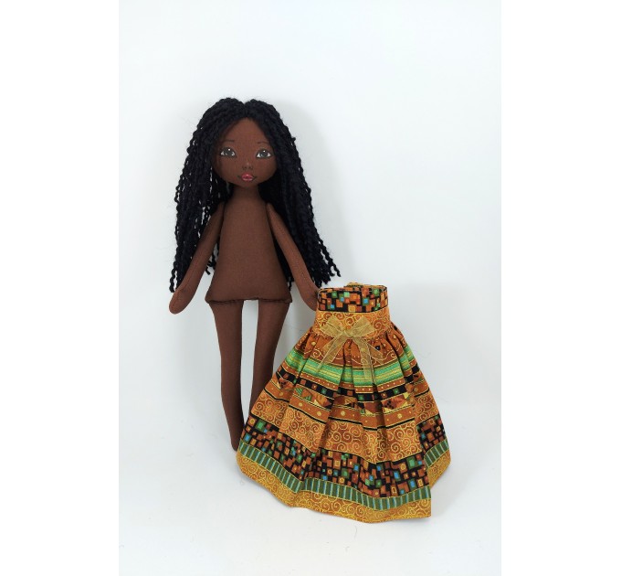 Little Doll Made Of Black Fabric