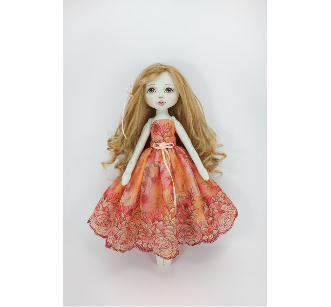 Little Rag Doll In A Orange Dress