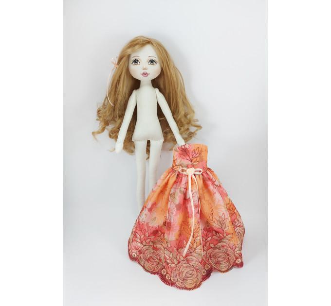 Little Rag Doll In A Orange Dress