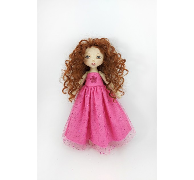 Rag Doll In A Purple Dress With Red Curly Hair